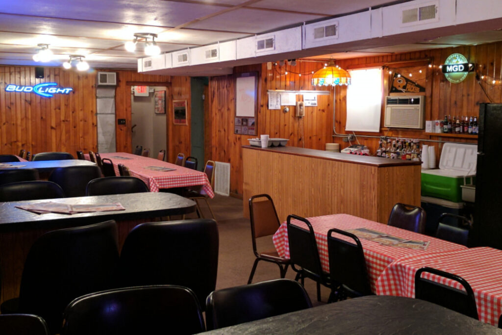 A graphic of the bar and raised table seating in The Loft