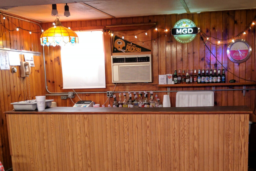 A graphic of the stocked bar located in The Loft