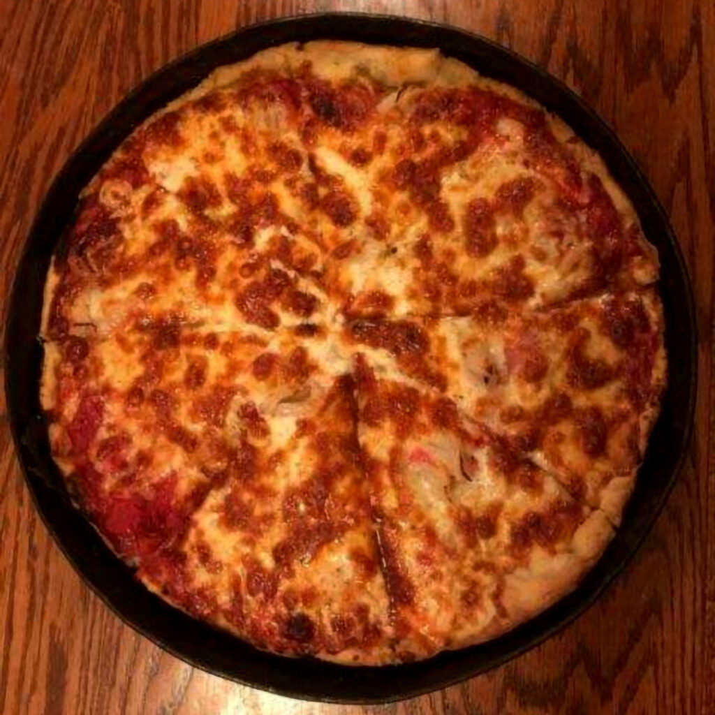 A graphic of a deep dish Big Cheese pizza with onions added.